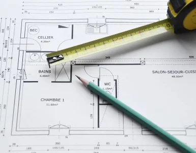 Un plan 2D avec un mètre ruban et crayon en dessus