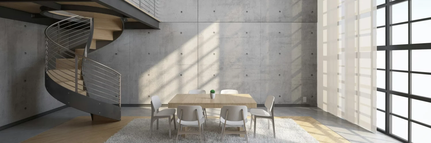 Un loft avec un escalier elliptiques